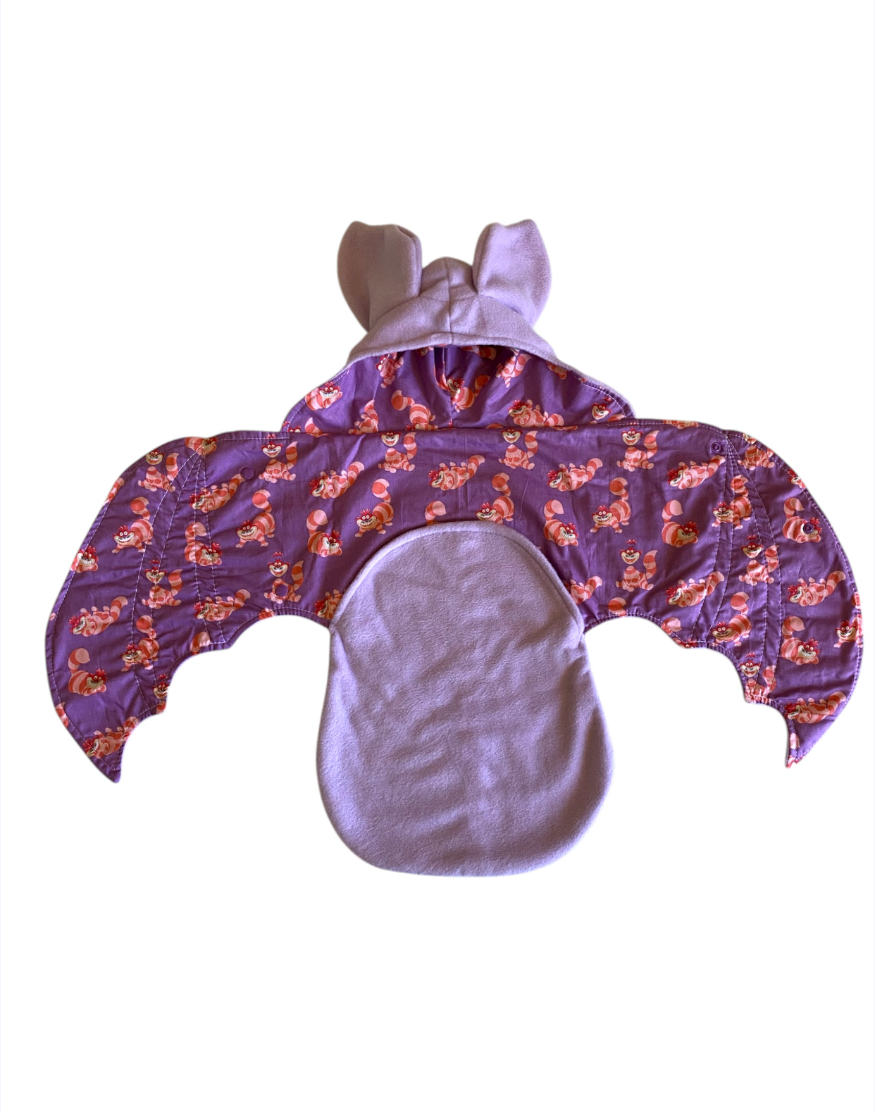 Purple costume with Alice in wonder land pattern on a white background