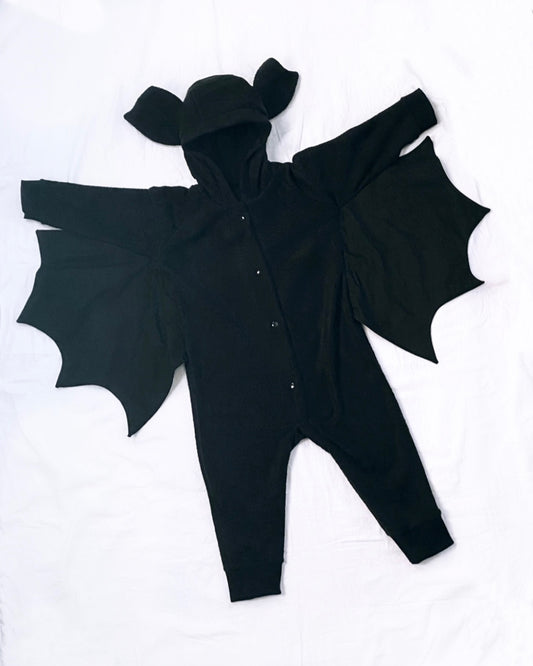 Black baby romper with bat wings on a white background