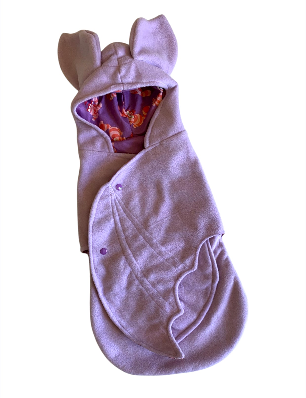 Purple baby swaddle with ears on a white background