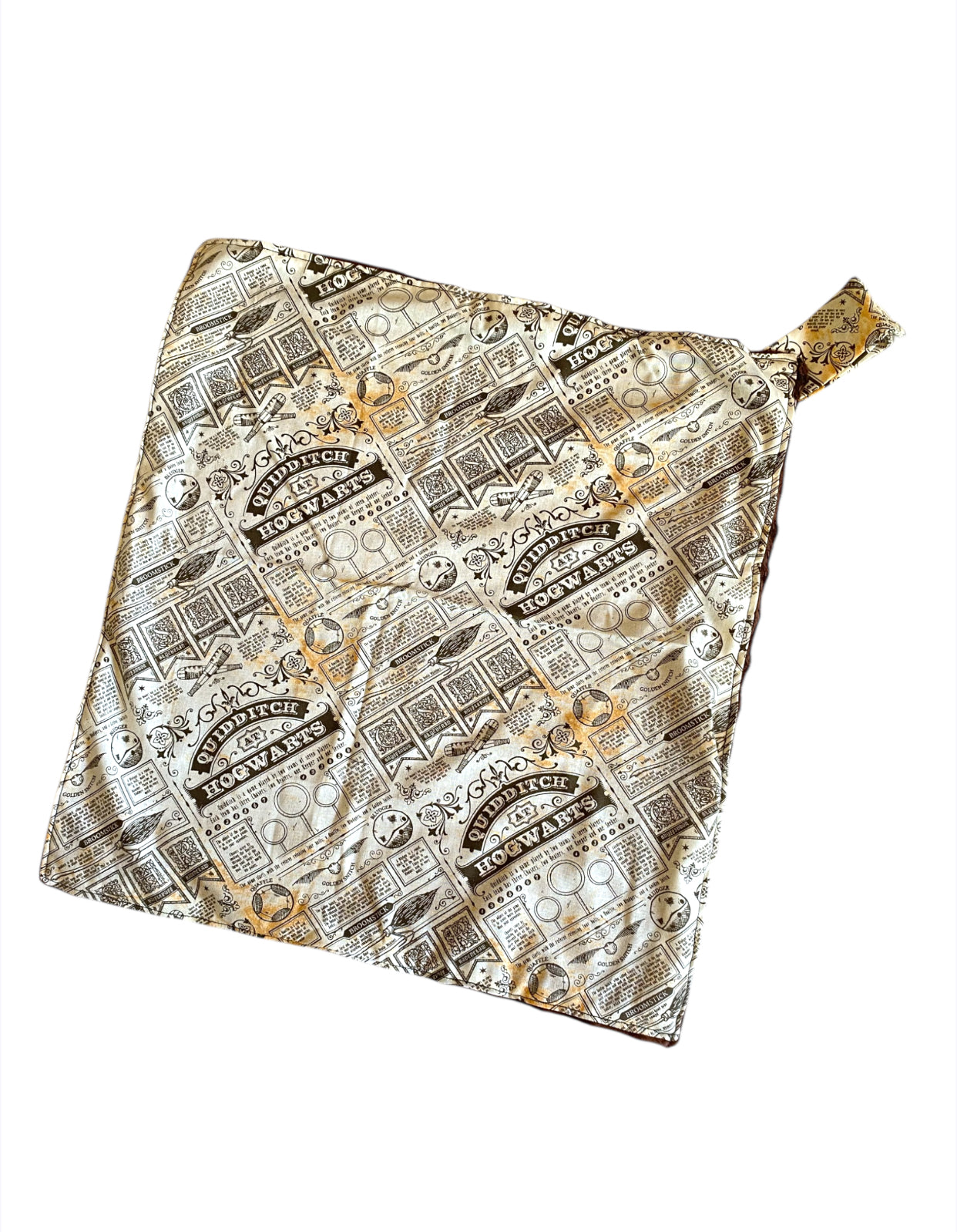 Patterned fabric with text and designs on a white background