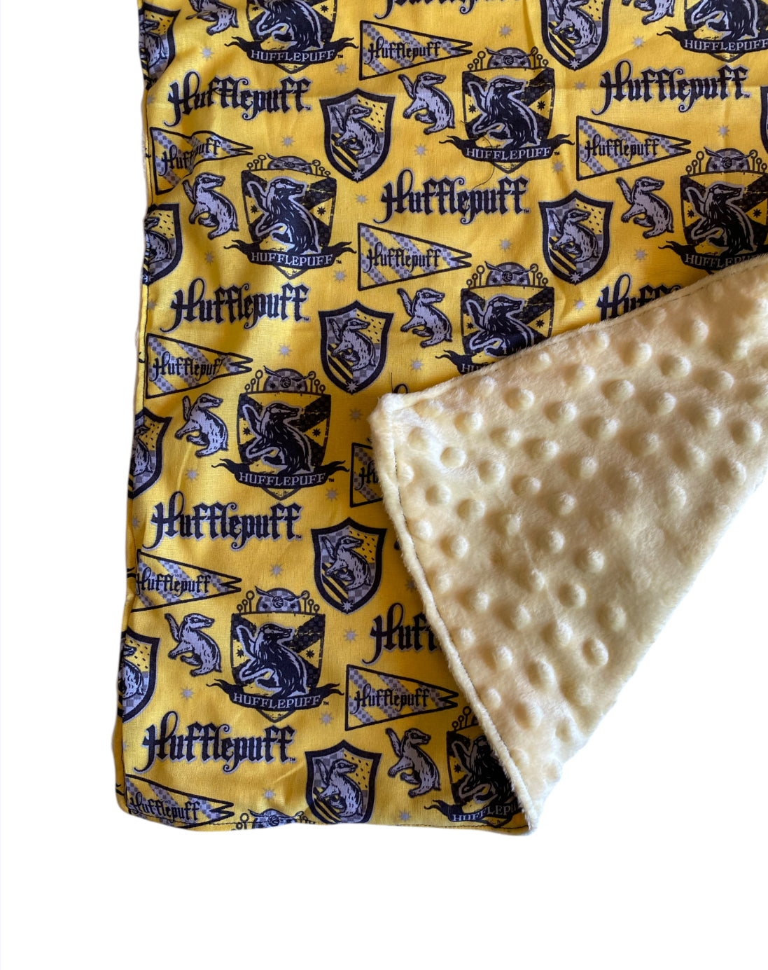 Hogwarts-themed fabric with Hufflepuff logo and yellow minky dot fabric