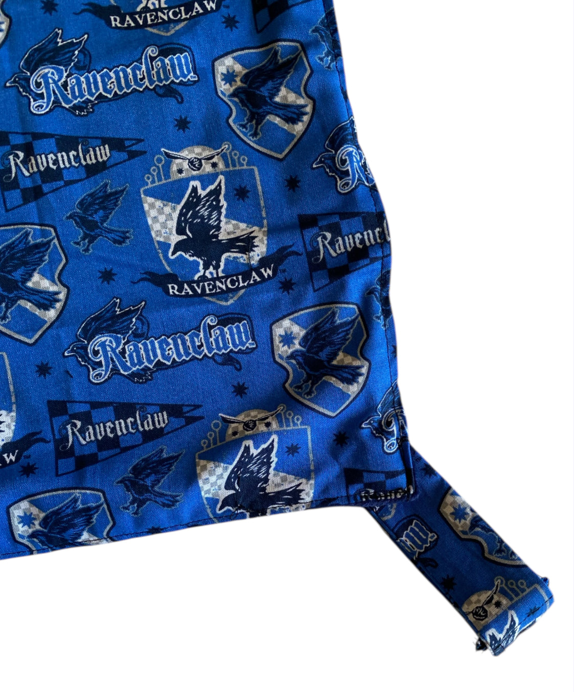 Blue fabric with Ravenclaw logo and text,  from Harry Potter..