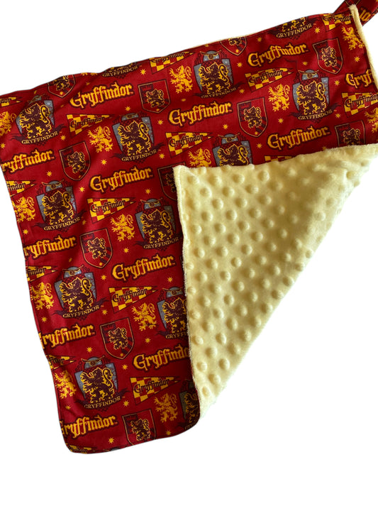 Baby blanket with Gryffindor pattern on a white background