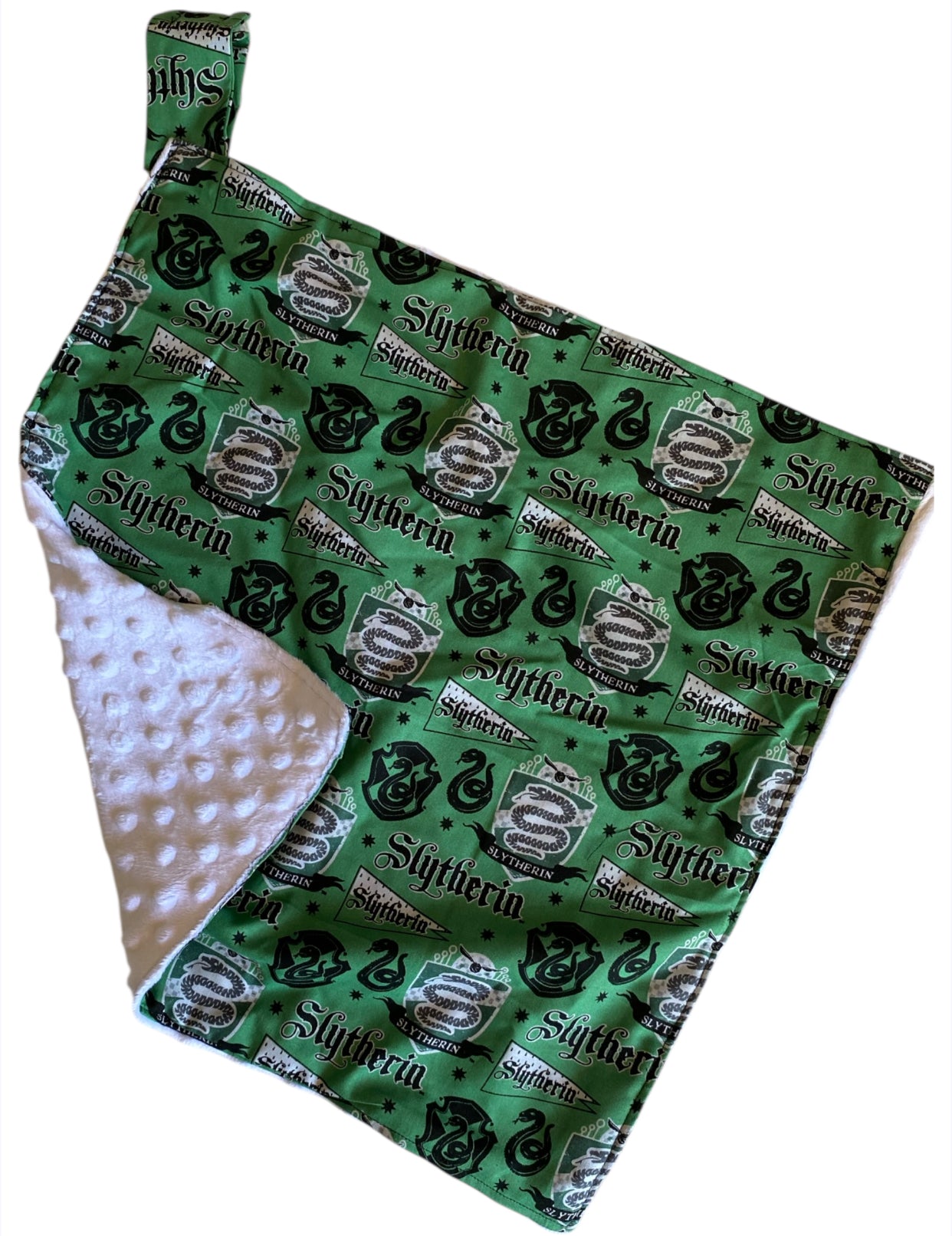 Baby blanket with Slytherin pattern on a green background