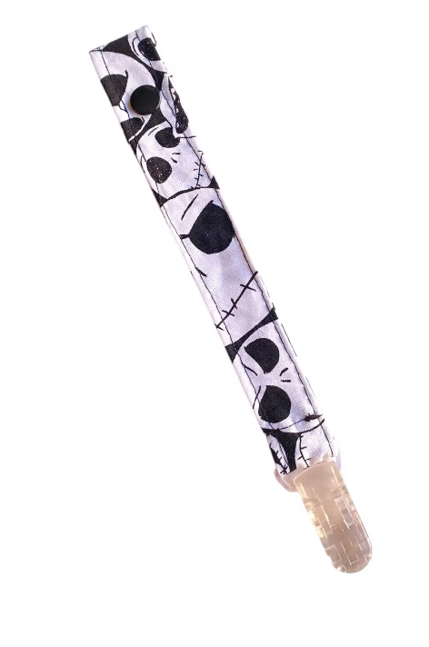 black and white jack skellington pacifier clip on white back ground