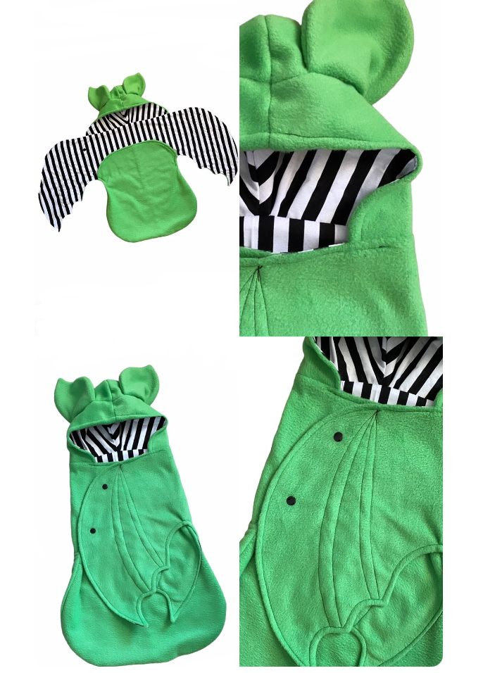 Green baby outfit with hood and ears, including a matching hat and booties, on a white background.
