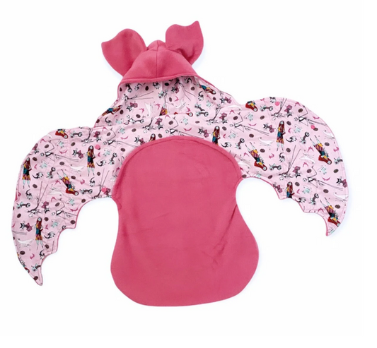 Pink baby seat cover with cartoon character pattern on a white background
