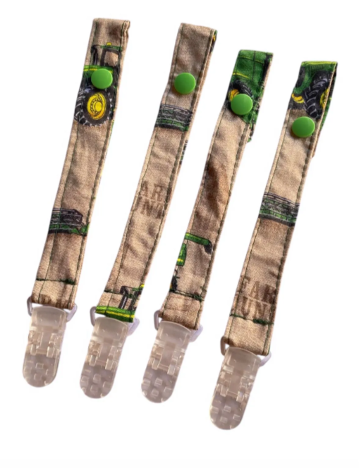 green tan tractor baby clip