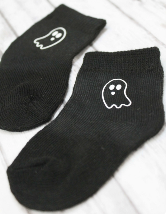newborn ghost print black socks on white background
